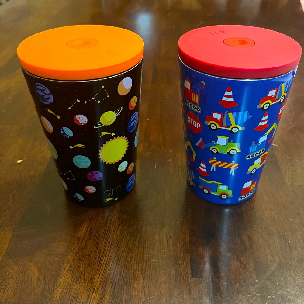 Set of (2) Simple Modern Space and Trucks tumbler cups with screw on lid.